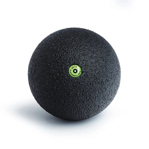 Black massage ball with a green logo on a white background