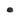 black textured massage ball on a white background